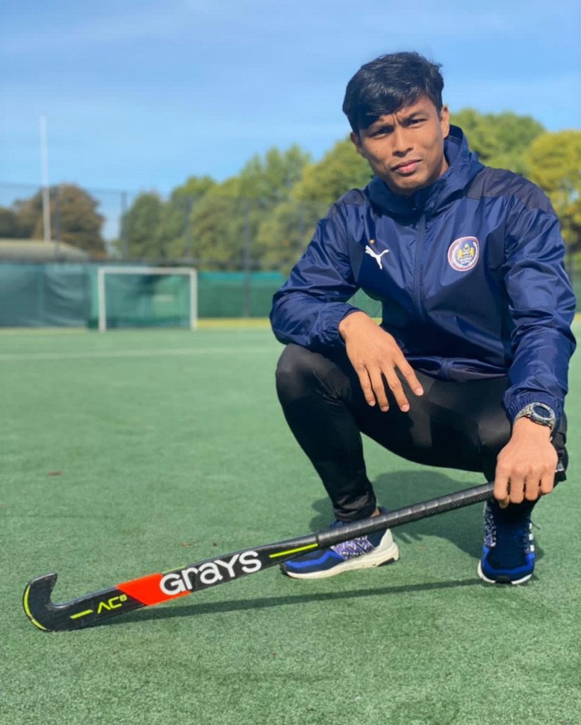 Skilled hockey drag flicker Najmi Farizal in the United Kingdom with his Grays AC Hockey stick